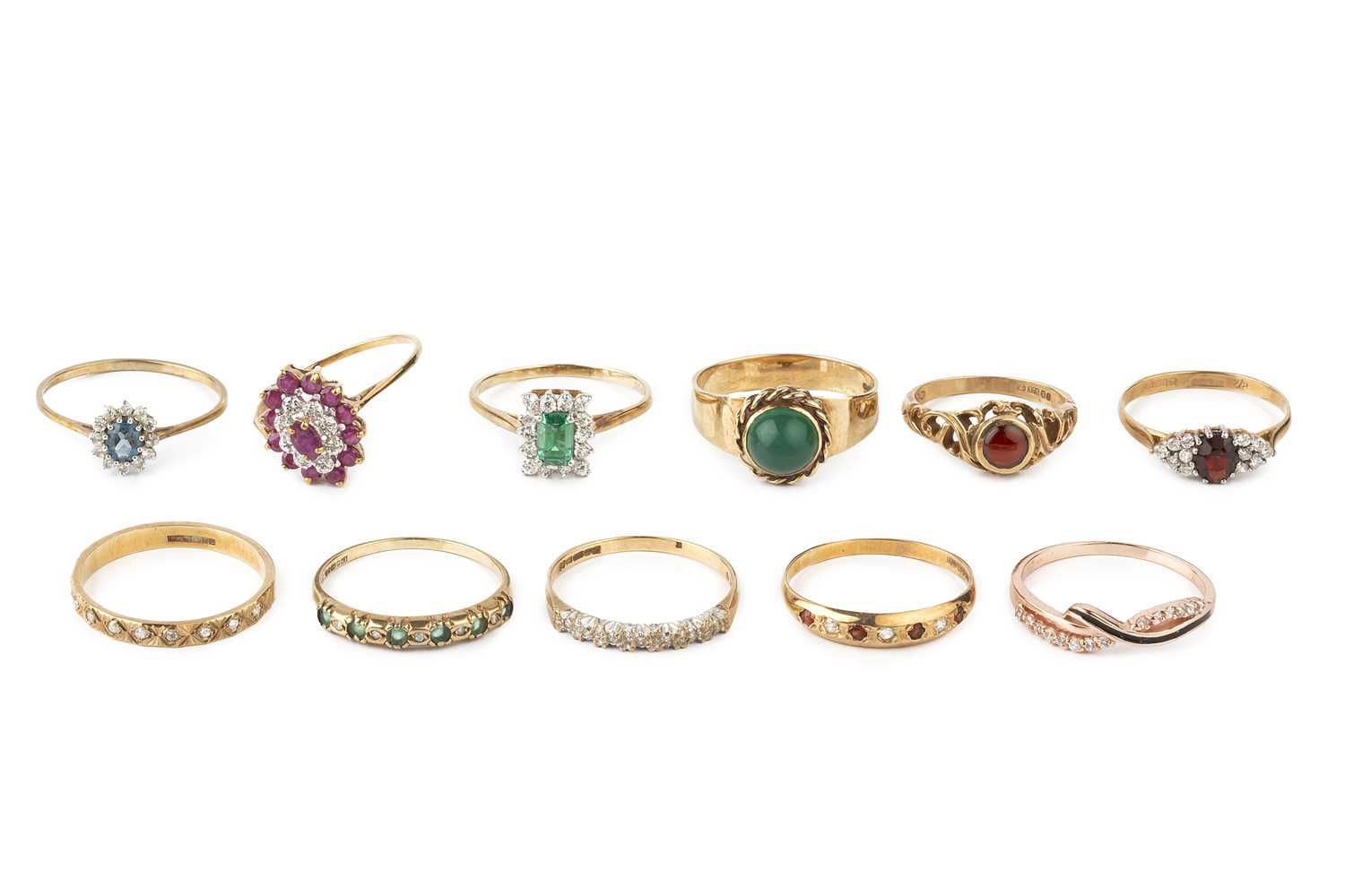 Lot 67 - A collection of dress rings, to include a ruby...