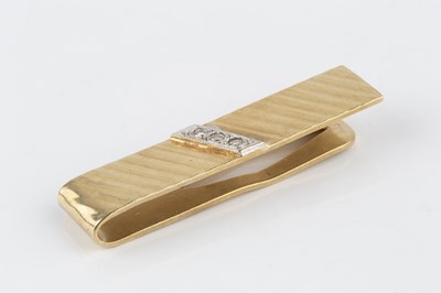 Lot 55 - A diamond set money clip, applied with a...