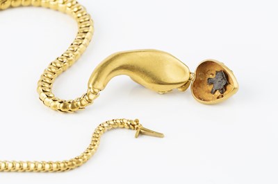 Lot 12 - A mid 19th century garnet and gem set serpent...