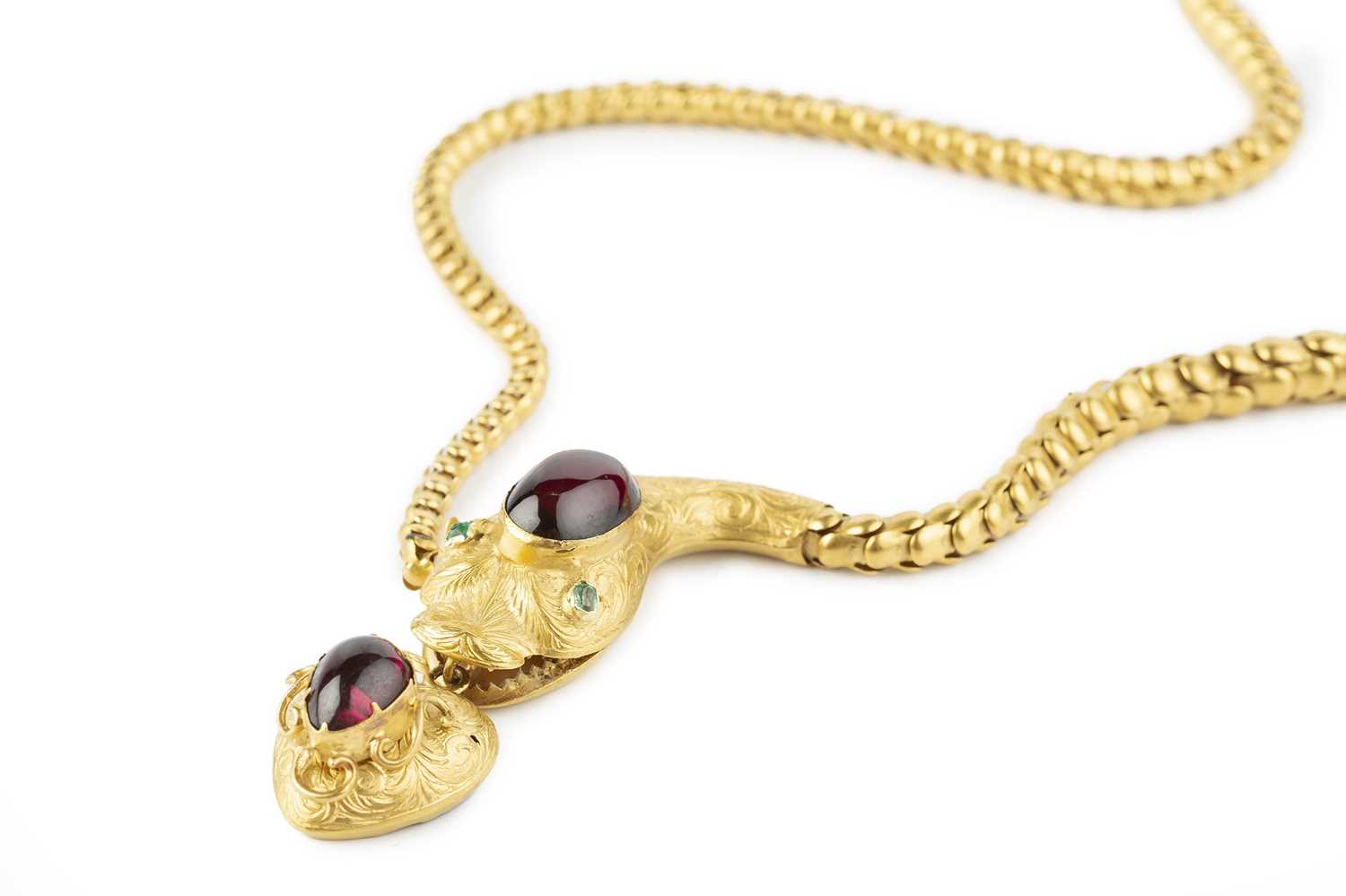 Lot 12 - A mid 19th century garnet and gem set serpent...