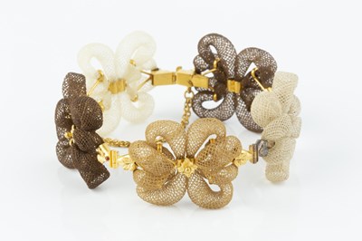 Lot 14 - A 19th century hairwork bracelet, designed as...