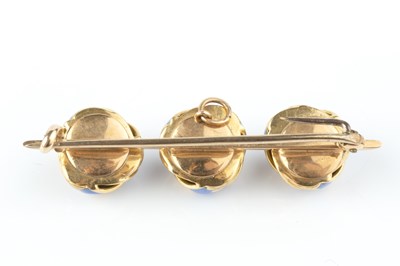 Lot 44 - An enamel and diamond bar brooch, designed as...