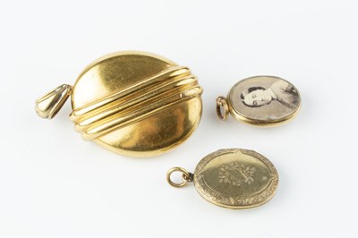 Lot 11 - A Victorian oval locket pendant, applied with...