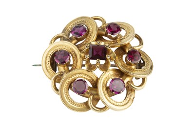 Lot 229 - A garnet and diamond set panel brooch,...