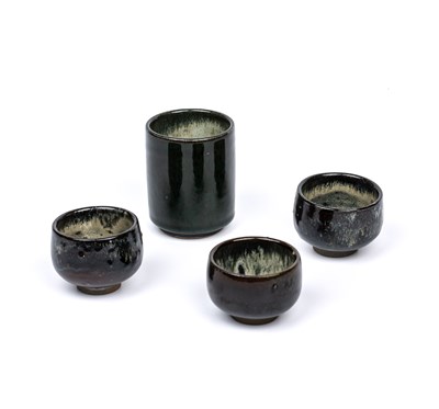 Lot 589 - Koishiwara Kiln Three yunomi dark purple glaze...