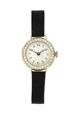 Lot 199 - A diamond set cocktail watch, the circular...