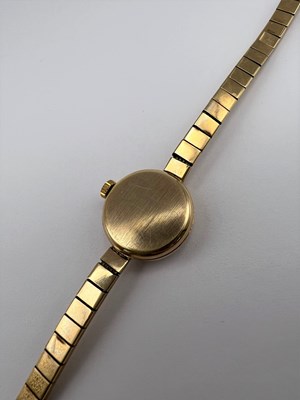 Lot 222 - A lady's 9ct gold bracelet watch, the circular...