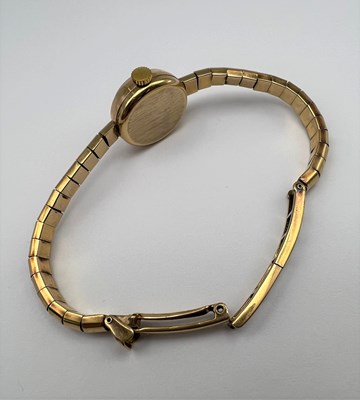 Lot 222 - A lady's 9ct gold bracelet watch, the circular...