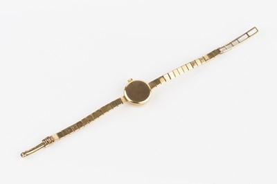 Lot 222 - A lady's 9ct gold bracelet watch, the circular...