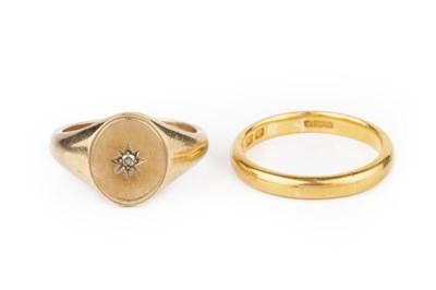 Lot 86 - A 22ct gold wedding band, and a diamond set...