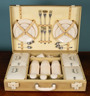 Lot 184 - A vintage picnic set with a fitted interior