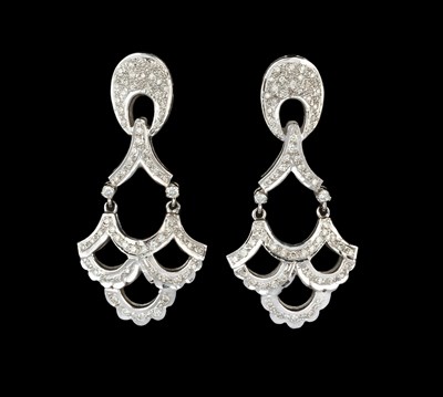 Lot 187 - A pair of diamond ear pendants, each with a...