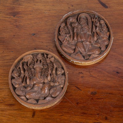 Lot 229 - Pair of wooden plaques Indian depicting Hindu...