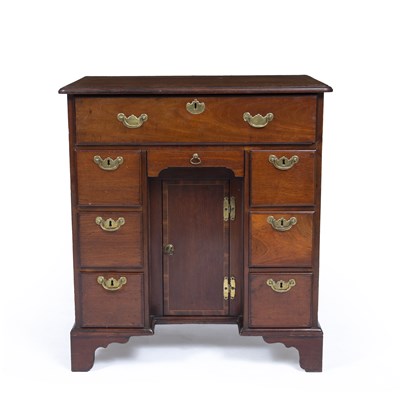 Lot 100 - A George III style mahogany kneehole desk with...