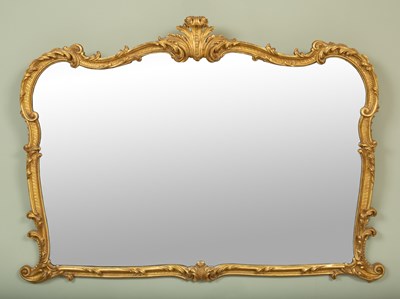 Lot 516 - A decorative gilt overmantel mirror