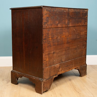 Lot 309 - A George III chest of drawers, darker mahogany,...