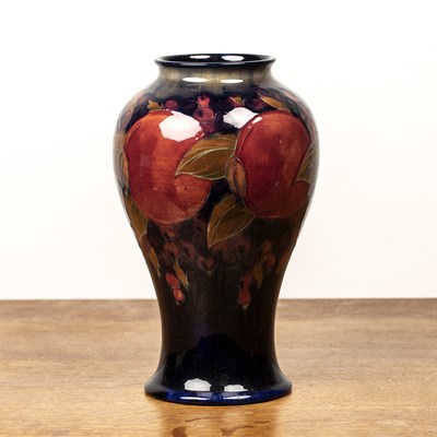 Lot 294 - Moorcroft pottery 'Pomegranate' tall baluster...