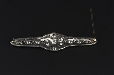 Lot 185 - A diamond panel brooch, the shaped and...