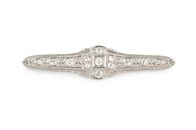 Lot 185 - A diamond panel brooch, the shaped and...