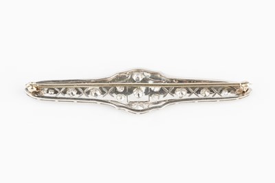 Lot 185 - A diamond panel brooch, the shaped and...