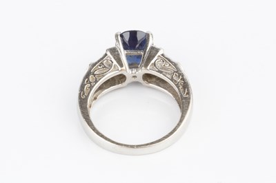 Lot 168 - A sapphire and diamond dress ring, the oval...