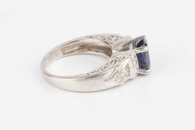 Lot 168 - A sapphire and diamond dress ring, the oval...