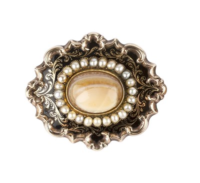 Lot 34 - A Victorian enamel and gem set memorial brooch,...