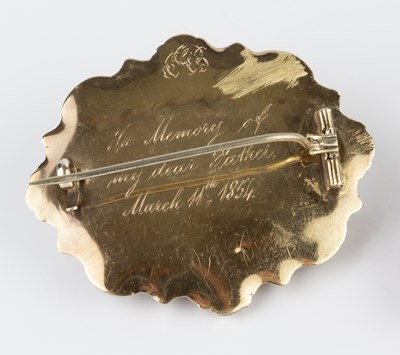Lot 34 - A Victorian enamel and gem set memorial brooch,...