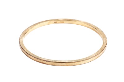 Lot 4 - A 9ct gold slave bangle, of hollow form, with...