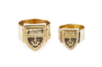 Lot 58 - Two 18ct gold signet rings, each with a shield-...