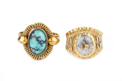 Lot 74 - A turquoise single stone dress ring, the oval...