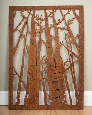 Lot 1079 - A pierced steel silhouette picture of autumn woodland trees