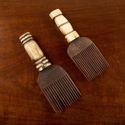 Lot 191 - Pair of wooden and bone handled combs African,...