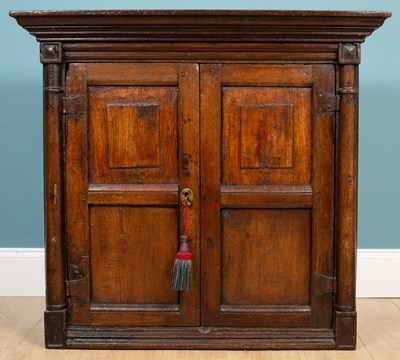 Lot 172 - An 18th century oak cupboard