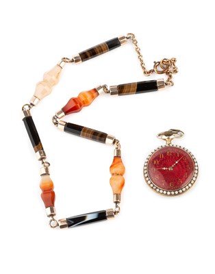 Lot 47 - A banded agate necklace, comprising a line of...