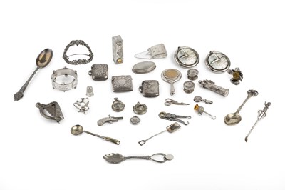 Lot 335 - A collection of small silver items, comprising...