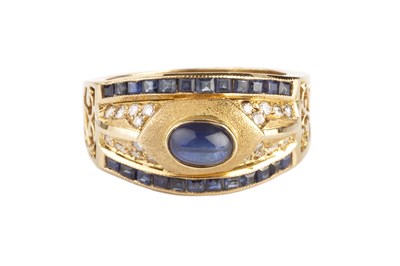 Lot 133 - A sapphire and diamond dress ring, the oval...