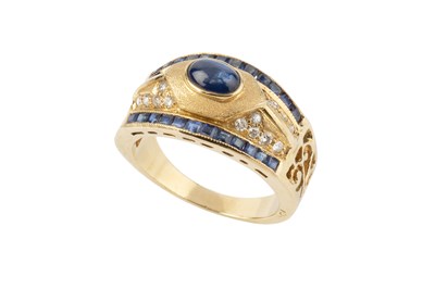 Lot 133 - A sapphire and diamond dress ring, the oval...