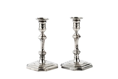 Lot 458 - A pair of George V silver candlesticks, with...