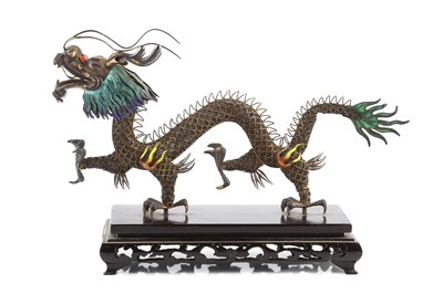 Lot 351 - A Chinese silver and enamel figure of a dragon,...