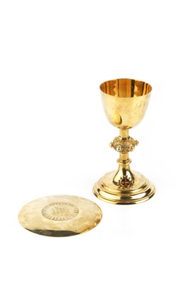 Lot 486 - A late Victorian silver-gilt chalice and paten,...