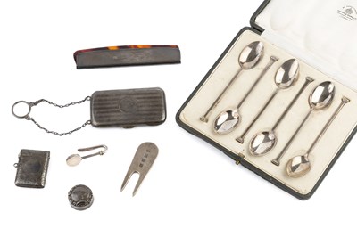 Lot 353 - A collection of small silver items, comprising...