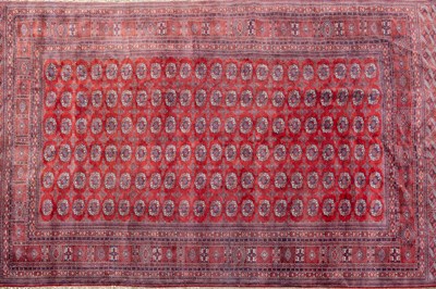 Lot 109A - A Baluchi style red ground carpet