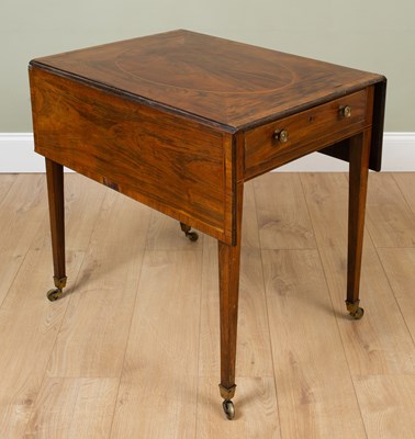 Lot 207 - A 19th century Goncalo Alves Pembroke table...