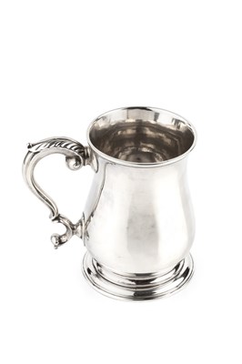 Lot 496 - An early George III silver baluster mug, with...