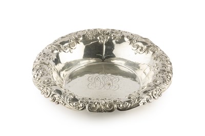 Lot 560 - An American silver dish, the shaped border...