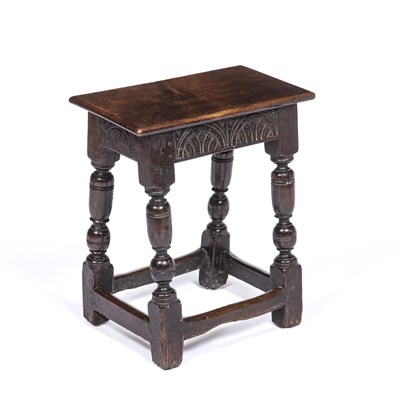 Lot 104 - An 18th century oak joint stool with turned...