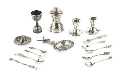 Lot 503 - A collection of silver, comprising a pepper...