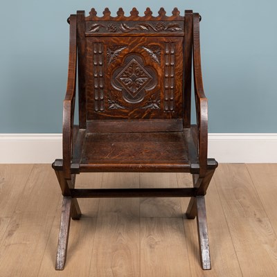 Lot 233 - A Glastonbury chair, mahogany, on X support...