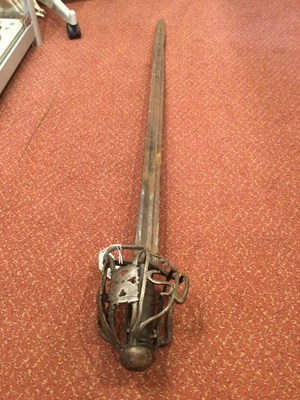 Lot 171 - A 17th century Scottish basket hilt back sword...